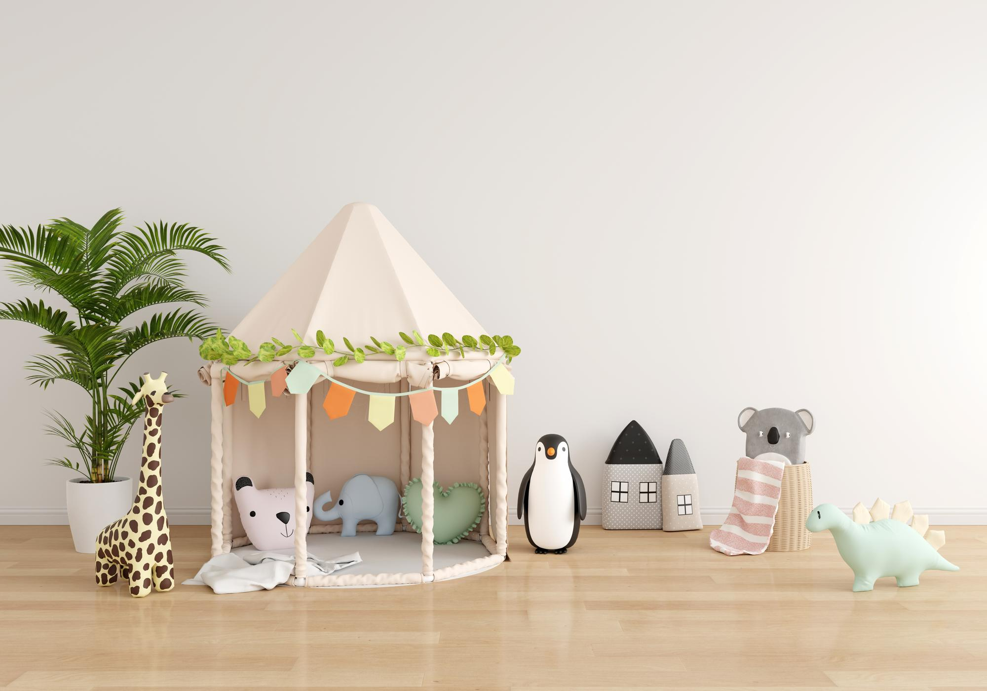 A colorful play tent featuring a giraffe, penguin, and various other animal designs for children's imaginative play