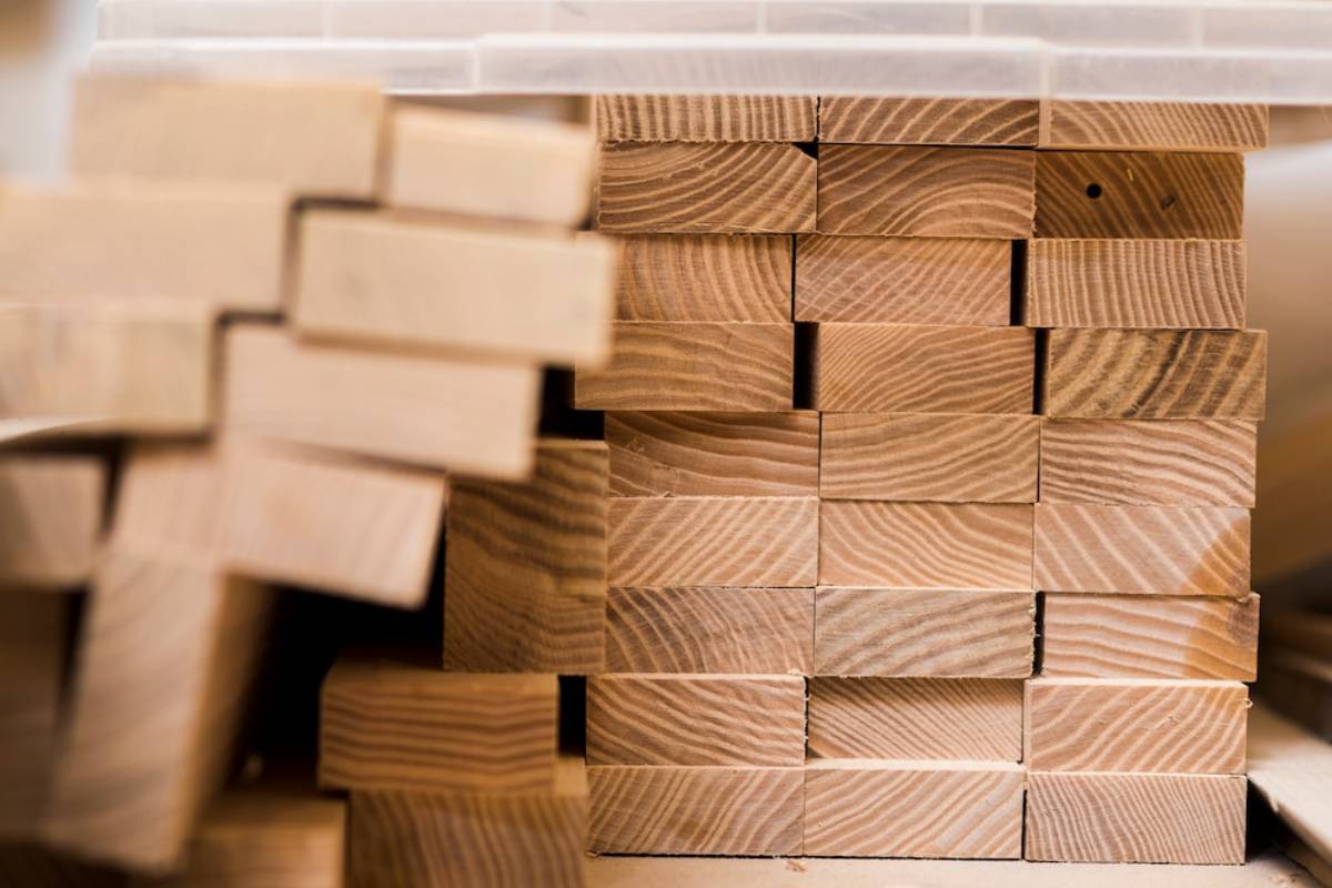 Close-up of neatly stacked wooden blocks with visible wood grain details.